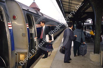 Passsenger boarding a train New York.