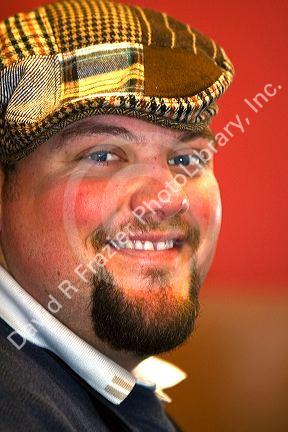 Portrait of a young man wearing a hat. MR