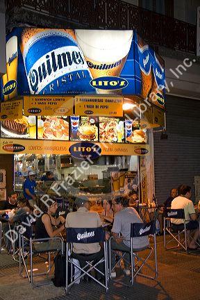 People dine outdoors at a cafe in Buenos Aires, Argentina.