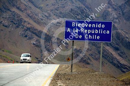 Road sign welcoming you to Chile on the Argentina border in the Andes Mountain Range.