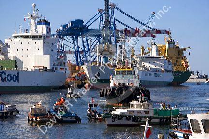 Container ships and small boats in the Port at Valparaiso, Chile.
