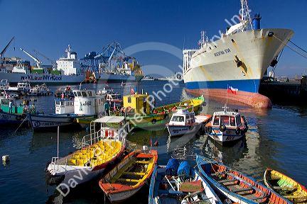Container ships and small boats in the Port at Valparaiso, Chile.