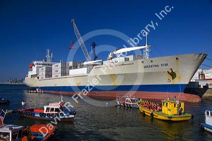 Argentina Star container ship and small boats in the Port at Valparaiso, Chile.