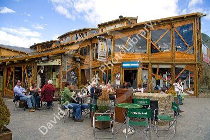People dine outdoors at a restaurant in El Calafate, Patagonia, Argentina.