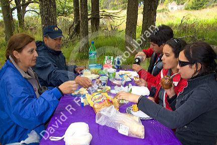 Family has a picnic in Los Glaciares National Park in Patagonia, Argentina.