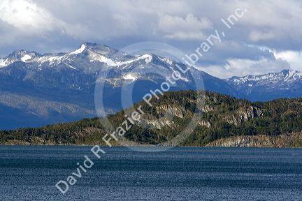 View of the Dientes de Navarino summits in Chile across the Beagle Channel near Ushuaia, Argentina.
