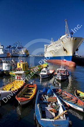 Container ships and small boats in the Port at Valparaiso, Chile.