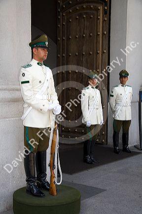 Guards outside the Palacio de la Moneda in Santiago, Chile.