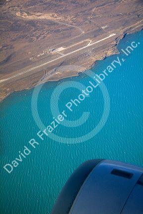 Aerial view of El Calafate airport along Lake Argentino from the window of an airplane, Patagonia, Argentina.