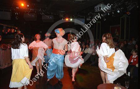 Tarantella dancers perform at a night club in Sorrento, Italy.