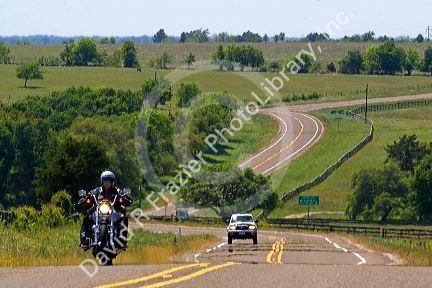 Motorcycle traveling on the Farm to Market Road 390 in Washington County, Texas.