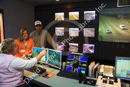 Mother showing her daughter video of traffic at the Ada County Highway District on Take Our Daughters and Sons To Work Day in Boise, Idaho.