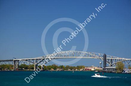 The Blue Water Bridge is a twin-span bridge that spans the St. Clair River between Port Huron, Michigan and Point Edward, Ontario.