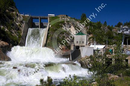 Water pouring from the outlet of Cascade Dam on Cascade Reservior flowing into the Payette River in Valley County, Idaho.