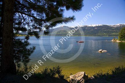Boating on Cascade Lake in Valley County, Idaho. Winter image taken from same location. http://www.drfphoto.com/photo/16242/