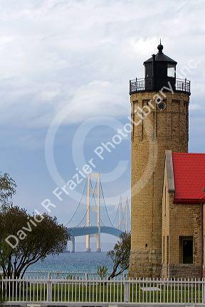 Old Mackinac Point Lighthouse and the Mackinac Bridge at Mackinaw City, Michigan.