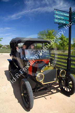 Children play in a Ford Model T inGreenfield Village at The Henry Ford in Dearborn, Michigan.
