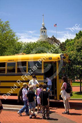 Students board a school bus at The Henry Ford in Dearborn, Michigan.
