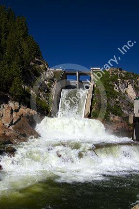 Water pouring from the outlet of Cascade Dam on Cascade Reservior flowing into the Payette River in Valley County, Idaho.