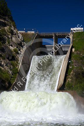 Water pouring from the outlet of Cascade Dam on Cascade Reservior flowing into the Payette River in Valley County, Idaho.