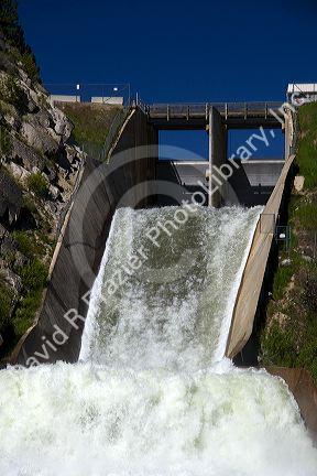 Water pouring from the outlet of Cascade Dam on Cascade Reservior flowing into the Payette River in Valley County, Idaho.