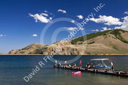 People on a boat dock at Mackay Reservoir in Custer County, Idaho.