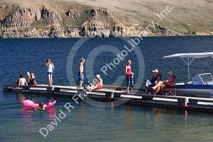 People on a boat dock at Mackay Reservoir in Custer County, Idaho.