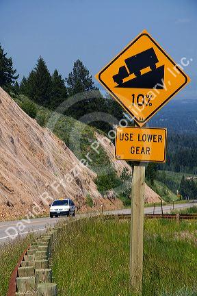 10% grade road sign atop the high mountain Teton Pass on Wyoming Highway 22 near the state border of Wyoming and Idaho.