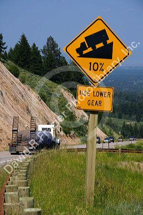 10% grade road sign atop the high mountain Teton Pass on Wyoming Highway 22 near the state border of Wyoming and Idaho.