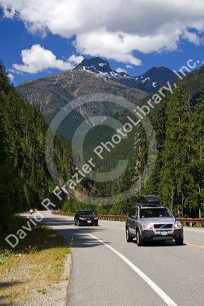 Automobiles travel on Washington State Highway 20 in the North Cascade Range, Washington.