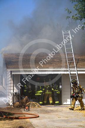 Firefighters respond to a house fire in Boise, Idaho.