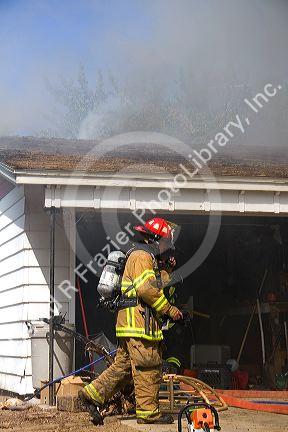 Firefighters respond to a house fire in Boise, Idaho.
