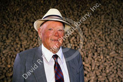 Portrait of J.R. Simplot, founder of the J.R. Simplot Company agricultural supplier specializing in potatoes.