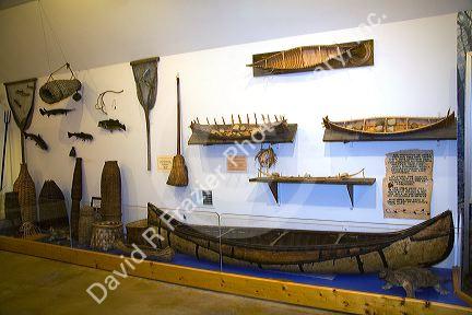 Native American birch bark canoe and other historic artifacts in the Kearsarge Indian Museum, Education and Cultural Center located in Warner, New Hampshire, USA.