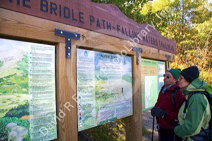 Hikers at the Bridle Path-Falling Waters Trail Head at Mount Lafayette of the Franconia Range in the White Mountain National Forest, New Hampshire, USA.