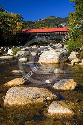 Covered bridge crossing the Swift River in the White Mountain National Forest at Albany, New Hampshire, USA.