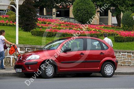 Compact car parked on the street in the town of Gernika-Lumo in the province of Biscay, Basque Country, Northern Spain.