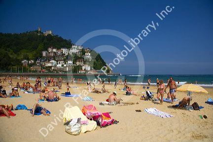 Beach scene at La Concha Bay in the city of Donostia-San Sebastian, Guipuzcoa, Basque Country, Northern Spain.
