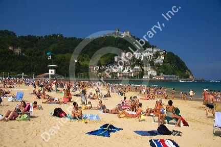 Beach scene at La Concha Bay in the city of Donostia-San Sebastian, Guipuzcoa, Basque Country, Northern Spain.