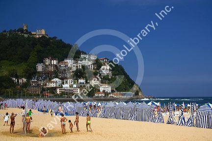 Beach scene at La Concha Bay in the city of Donostia-San Sebastian, Guipuzcoa, Basque Country, Northern Spain.