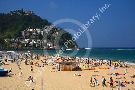 Beach scene at La Concha Bay in the city of Donostia-San Sebastian, Guipuzcoa, Basque Country, Northern Spain.