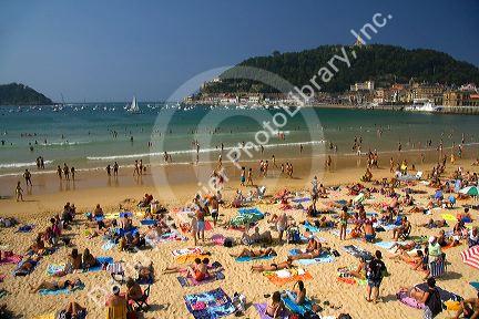 Beach scene at La Concha Bay in the city of Donostia-San Sebastian, Guipuzcoa, Basque Country, Northern Spain.