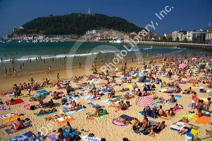 Beach scene at La Concha Bay in the city of Donostia-San Sebastian, Guipuzcoa, Basque Country, Northern Spain.