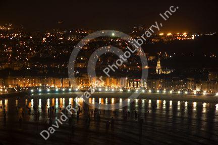 La Concha Bay and the city of Donostia-San Sebastian at night, Guipuzcoa, Basque Country, Northern Spain.