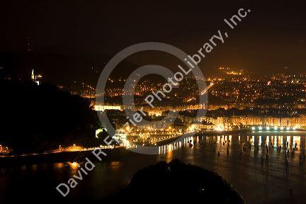 La Concha Bay and the city of Donostia-San Sebastian at night, Guipuzcoa, Basque Country, Northern Spain.