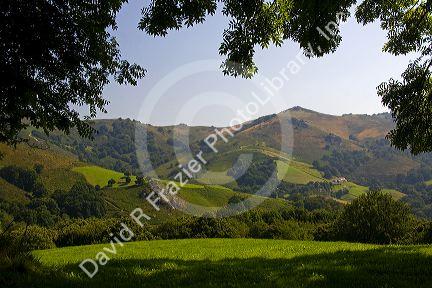 Rural farmland and rolling hills in the Baztan Valley of the Navarre region of northern Spain.