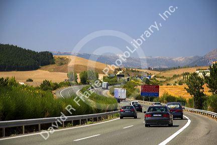Automobiles travel on the Autopista near Pamplona, Navarre, northern Spain.