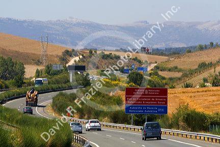 Automobiles travel on the Autopista near Pamplona, Navarre, northern Spain.