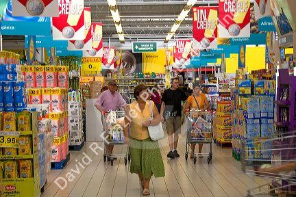 Customers shop inside the Eroski supermarket in the town of Castro Urdiales, Cantabria, northern Spain.