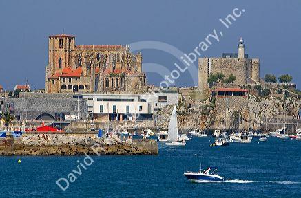 Gothic style church of Santa Maria and castle lighthouse in the harbor of Castro Urdiales, Cantabria, northern Spain.